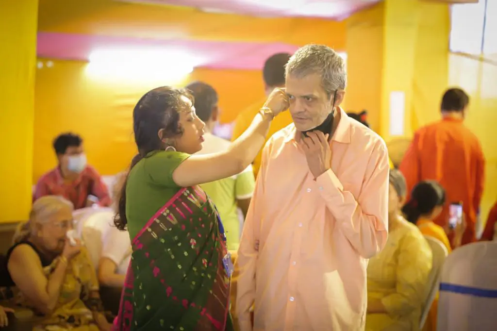 Happy senior citizen in India following healthy lifestyle tips