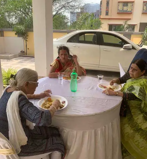 Senior citizens dining at old age home in Kolkata