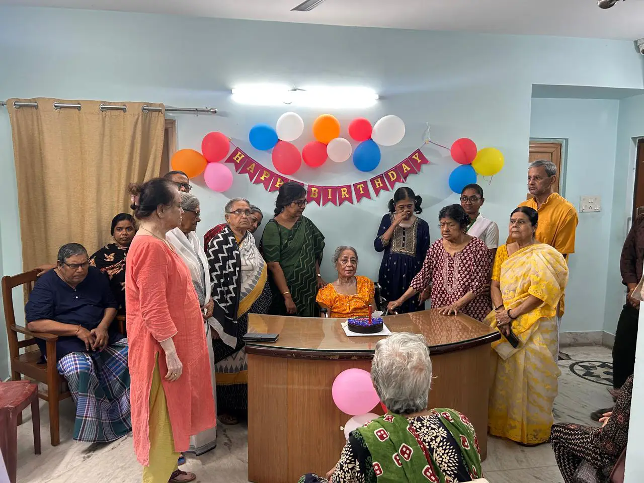 Senior citizen engaged in cognitive therapy activities with a trained therapist